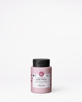 Pink jar with black lid on a white background