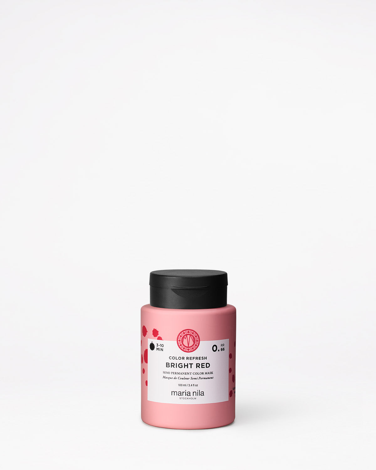 Pink hair color product jar with black lid on a white background